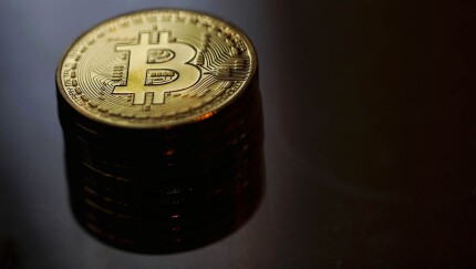 Bitcoin fell as much as 18% against the dollar to $978.76 after the decision from the SEC.