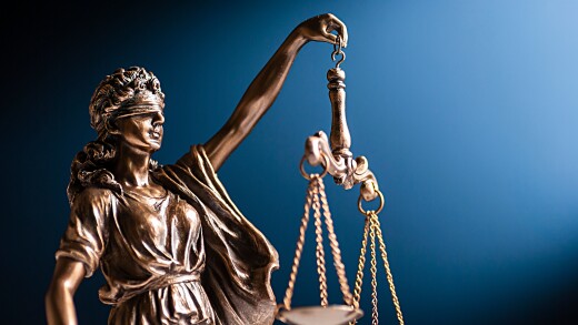 Bronze figurine of Lady Justice with her scales