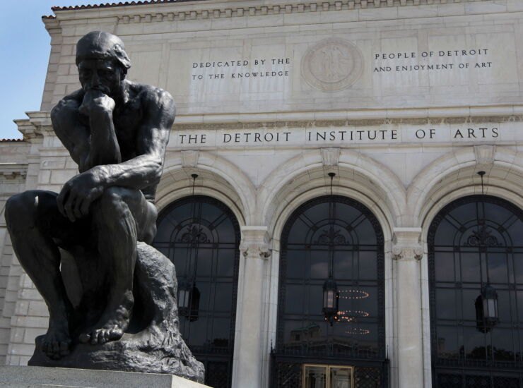 Auguste Rodin's "The Thinker" is displayed in front of The Detroit Institute of Arts in Detroit, Michigan, U.S., on Friday, July 19, 2013.