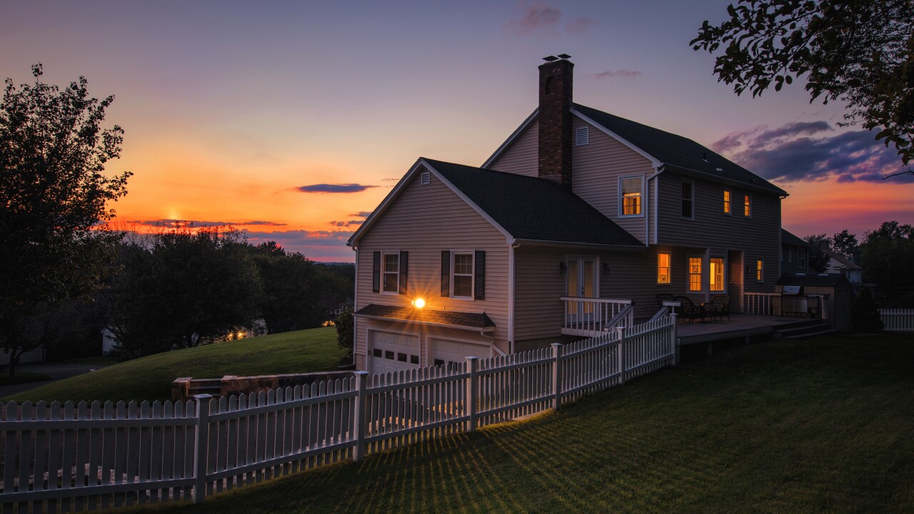 Colonial house sunset