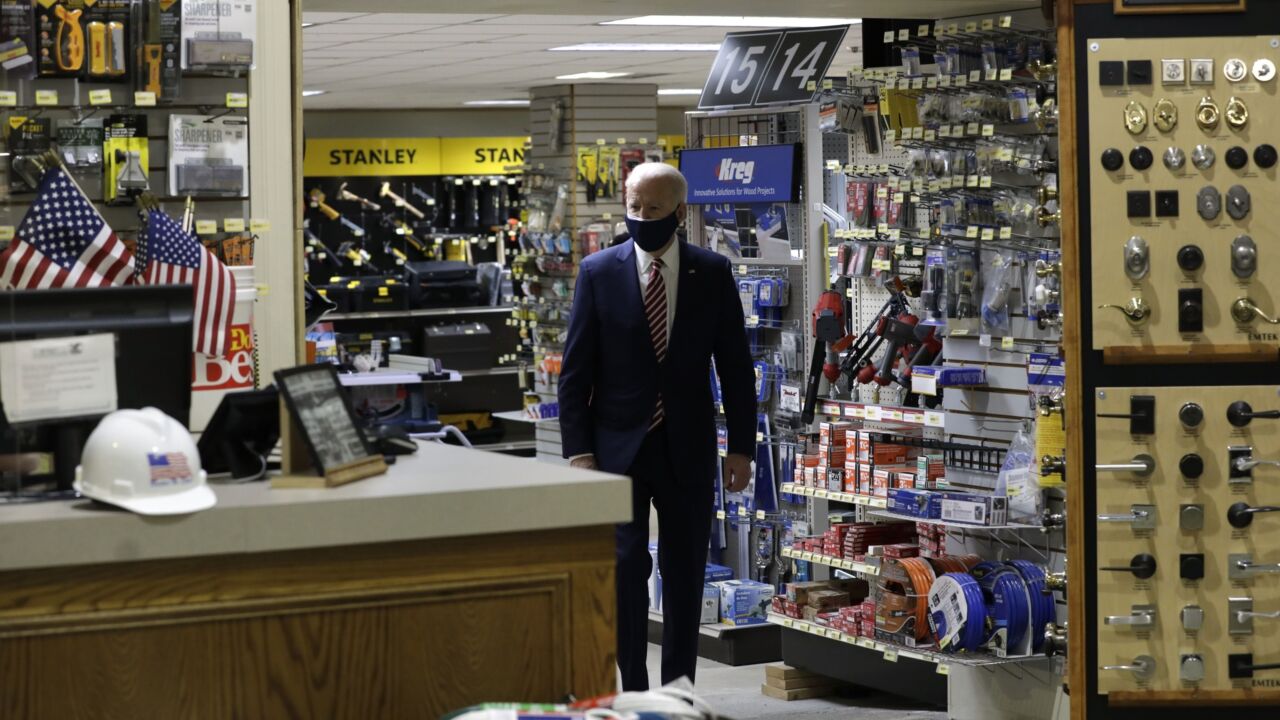 President Biden visits a Washington, D.C., hardware store in March. The store, W.S. Jenks & Son, received a forgivable loan from the Small Business Administration's Paycheck Protection Program.
