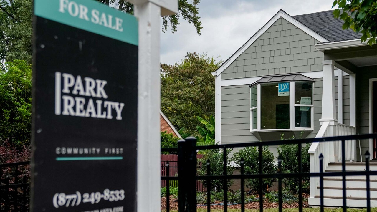 For Sale sign in front of Atlanta home