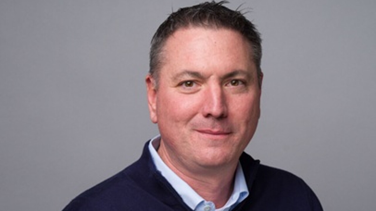 Headshot of John Grise