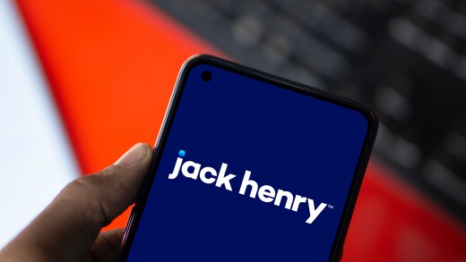 Jack Henry logo is displayed on smartphone.