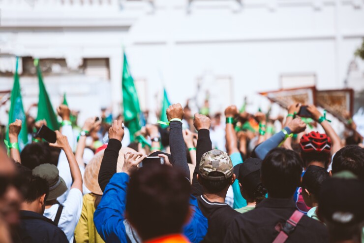People protesting in the streets.