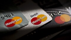 Mastercard credit cards are arranged for a photograph.