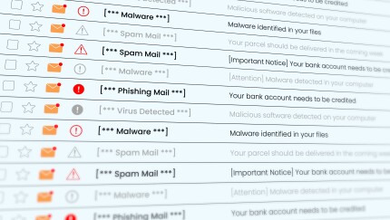 Email inbox on a computer screen showing phishing emails