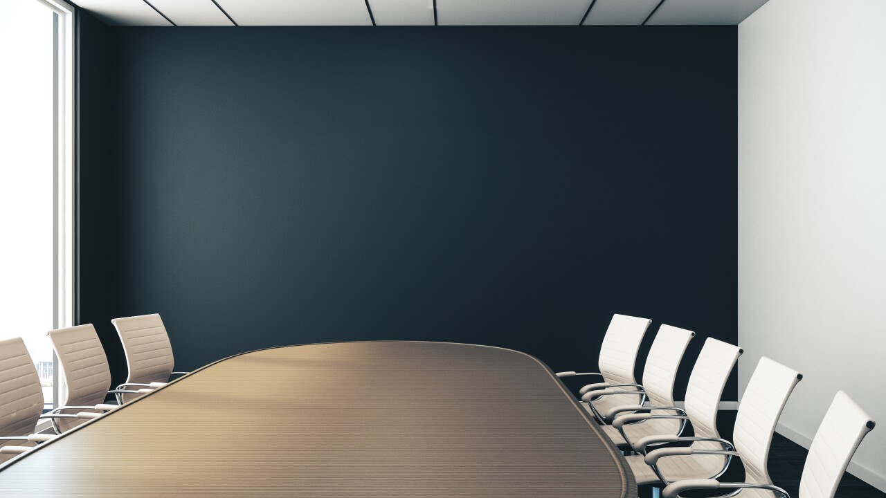 Empty conference room with table and chairs