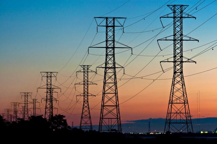 Power transmission lines are suspended from electricity pylons in Kearny, N.J.