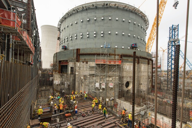 Workers build a control room for two new nuclear reactors at Plant Vogtle, Georgia, in August 2018.