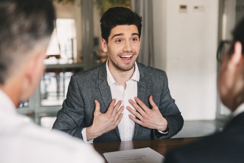 Job candidate interviewing looks surprised