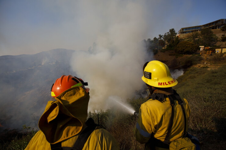 Firefighters fought the December 2017 Skirball Fire in a Los Angeles suburb that destroyed four homes and burned 475 acres.