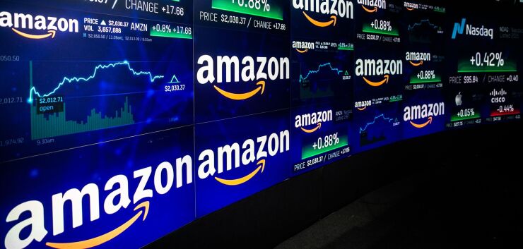 In tech stocks, the Invesco QQQ Trust Series 1, which tracks the Nasdaq-100 Index, closed with a market value of more than $100 billion for the first time since it began trading in 1999.