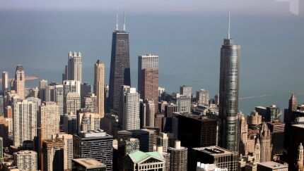 The John Hancock building, left, and Trump Tower, right, stand in the cityscape as seen from the Willis Tower in Chicago, Illinois, U.S., on Wednesday, Feb. 13, 2013.