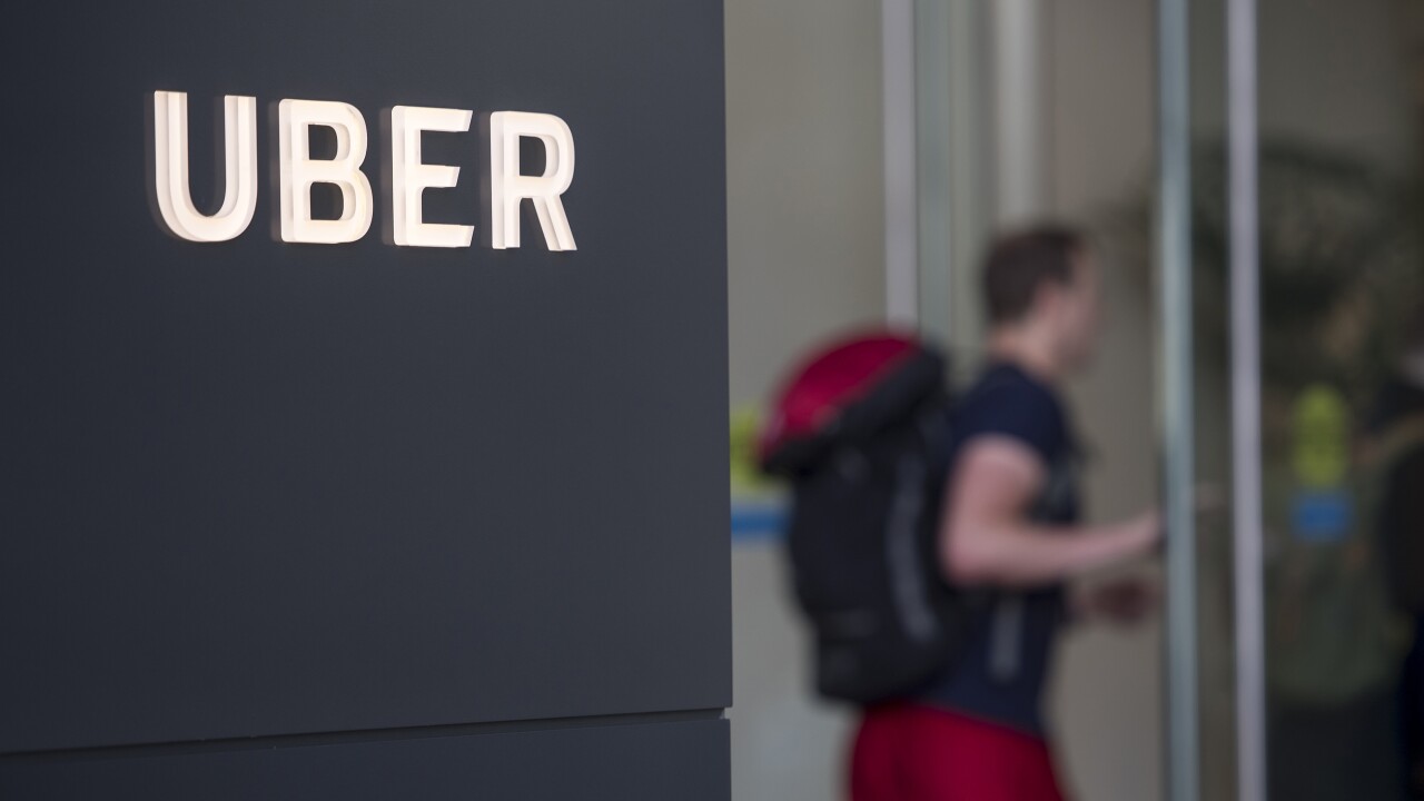 Uber Technologies signage is displayed outside the company's headquarters building in San Francisco.