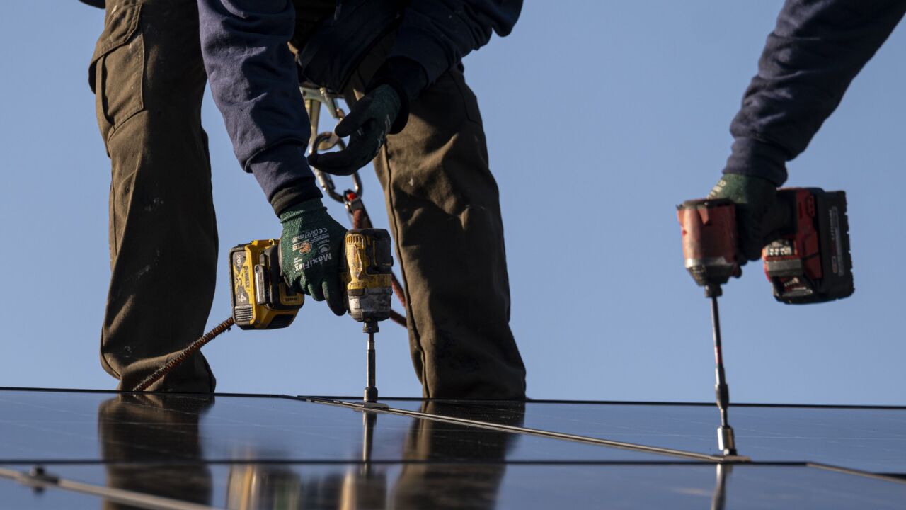 Solar Panel Installations As California Regulators Reconsider Move To Cut Solar Subsidies