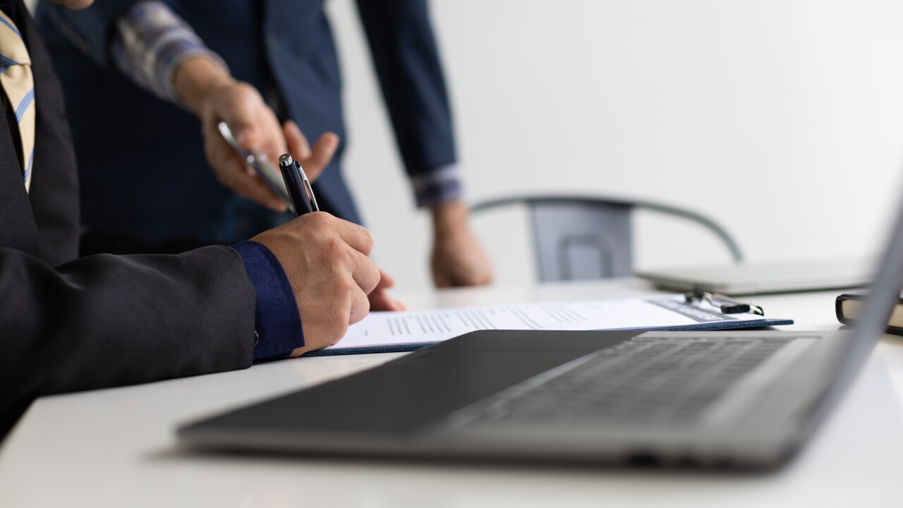 Employee signing a contract