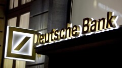 An illuminated sign for Deutsche Bank outside a bank branch in Frankfurt, Germany.