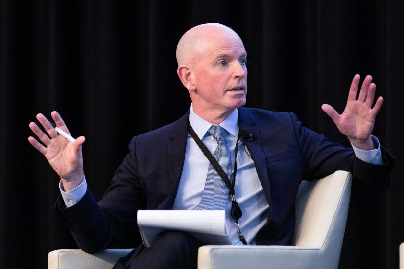 ICE Mortgage Technology President Tim Bowler speaks at an industry meeting held at the New York Stock Exchange