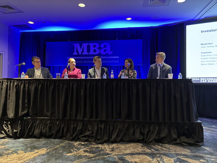 From left, Ken Hockstein of Voya Investment Management, Kate Amor, of Rate, Mack Walker, of Deephaven Mortgage, Audrie Gregory of Verus Mortgage Capital and John Toohig of Raymond James & Associates.