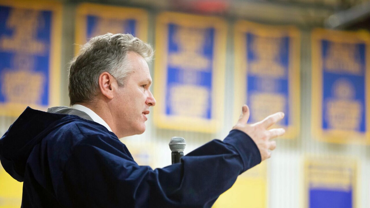 Mike Dunleavy is sworn in as Alaska's governor on December 3, 2018 in Kotzebue.