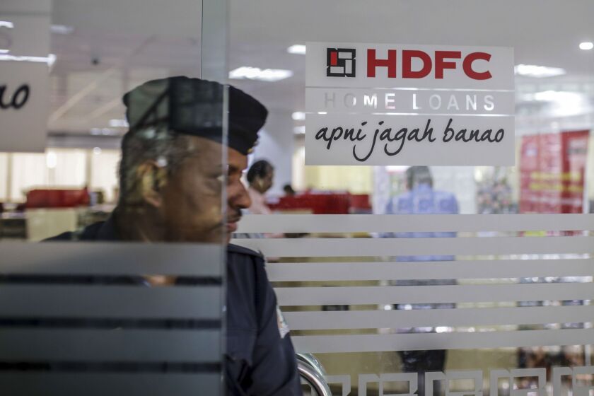 A customer exits an HDFC Bank branch in India.