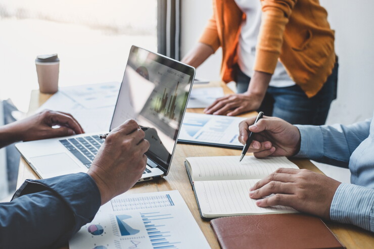 Business team meeting to conference, collaboration discussing working analyzing with financial data and marketing business strategy project, presentation and brainstorming to making profit of company.