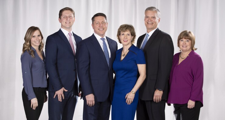 The Bellars Harris Wealth Management team includes, left to right, Laura Savage, client service associate; Axel Bellars, vice president; partners Tim Bellars, Claudia Bellars and Brad Harris; and Jeannie Hughes, client service manager.