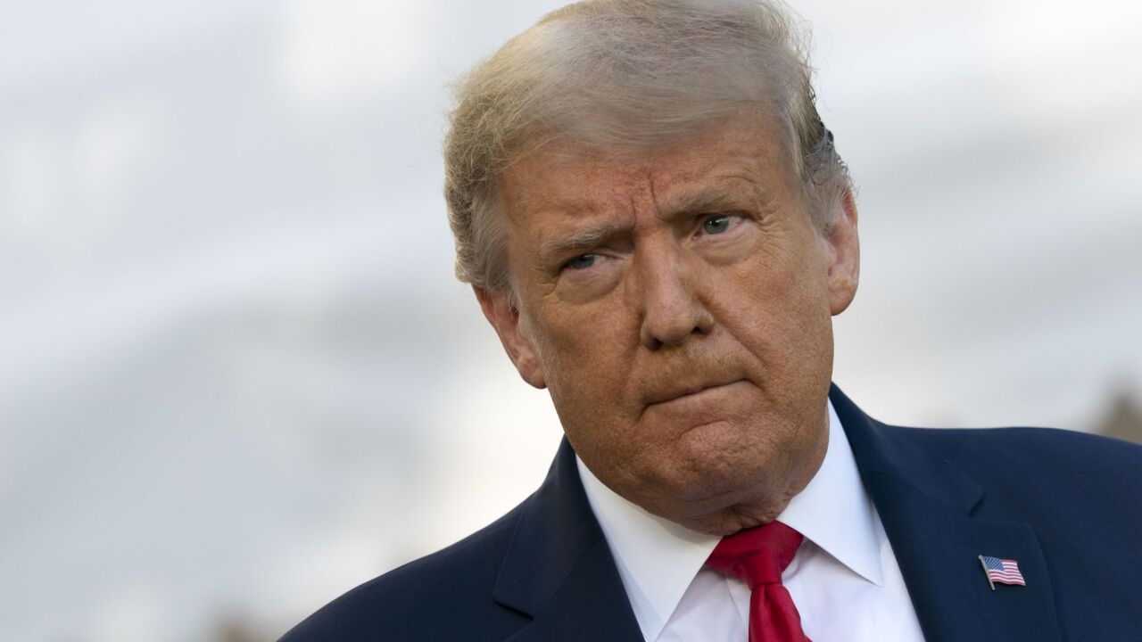 Donald Trump purse-lipped