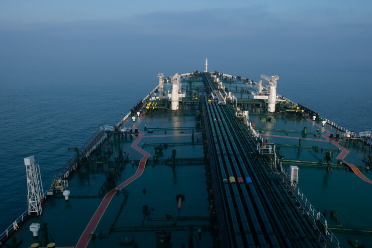 The deck of a ship in water.