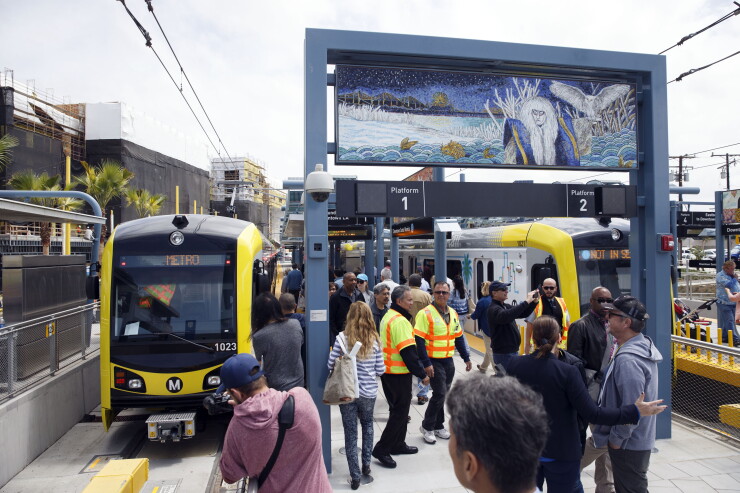 Passengers tour the Metro Expo Line light rail cars at the station in Santa Monica, California, U.S., on Friday, May 20, 2016.