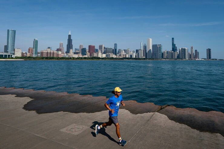 Runner with Chicago skyline in background