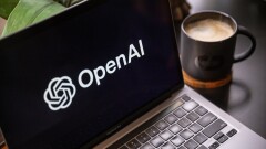The Open AI logo displayed on a laptop screen