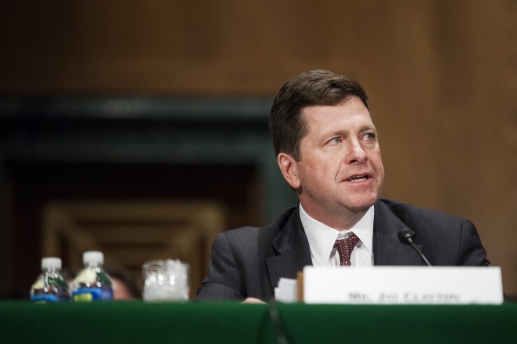 Jay Clayton, SEC Chair nominee, sits at table during a Senate Banking Committee confirmation hearing