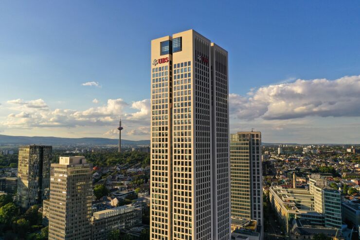 UBS Group AG logo sits on the bank's European Opera Tower (OpernTurm) headquarter skyscraper on the financial district skyline in Frankfurt, Germany