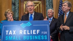 Senate Majority Leader Mitch McConnell, R-Ken., surrounded by fellow Republican senators