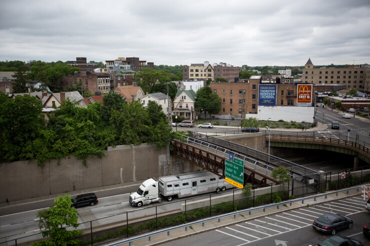 The Millennia development project at 20 Burling Lane, far left, stands across the New England Thruway in New Rochelle, U.S., on Tuesday, May 30, 2017.