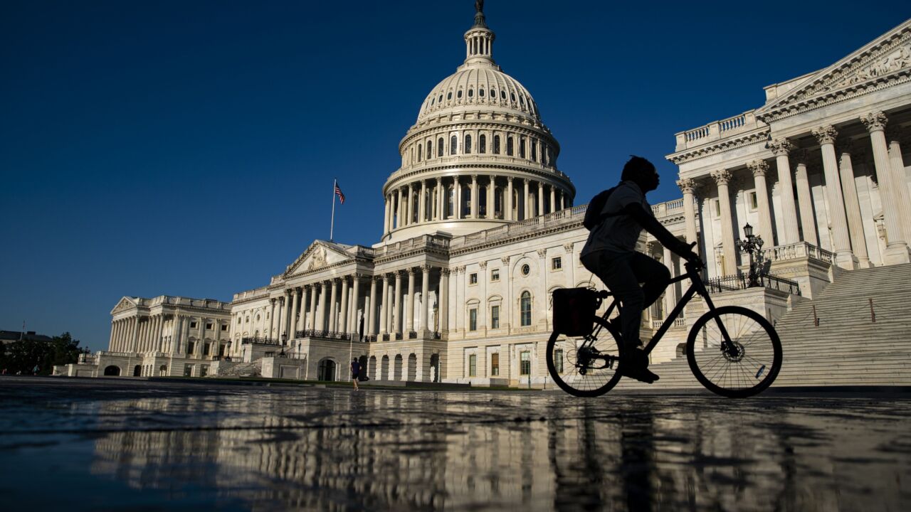 A bicyclist near the US Capitol in Washington, D.C., US, on Monday, June 6, 2022. Amid signs of internal discord, the US Supreme Court is waiting until the bitter end to do the largest share of its work in more than 70 years. Photographer: Al Drago/Bloomberg