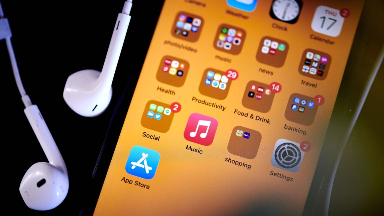 The Apple Music application icon on a smartphone arranged in New York, U.S., on Thursday, June 17, 2021. Apple Inc. would be prohibited from pre-installing its own apps on Apple devices under antitrust reform legislation introduced last week, said Democratic Representative David Cicilline, who is leading a push to pass new regulations for U.S. technology companies. Photographer: Gabby Jones/Bloomberg