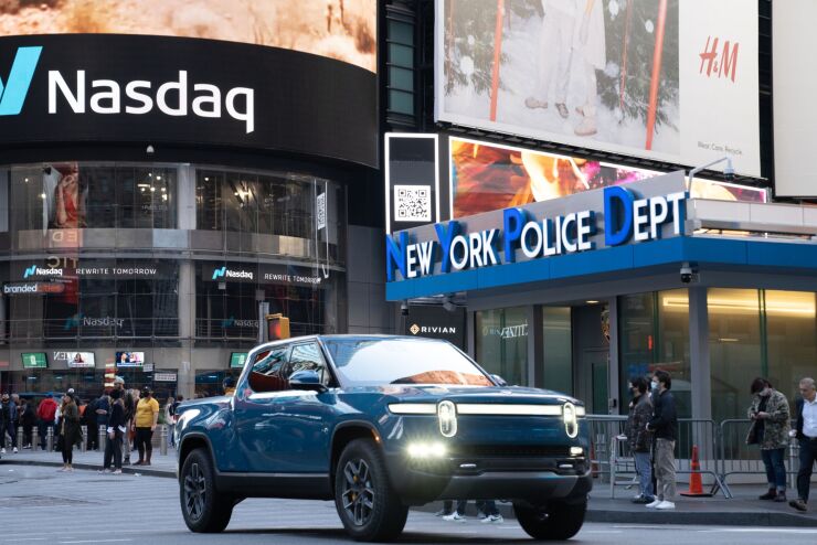 A Rivian R1T electric pickup truck during the company's IPO outside the Nasdaq MarketSite in Times Square, on Nov. 10.