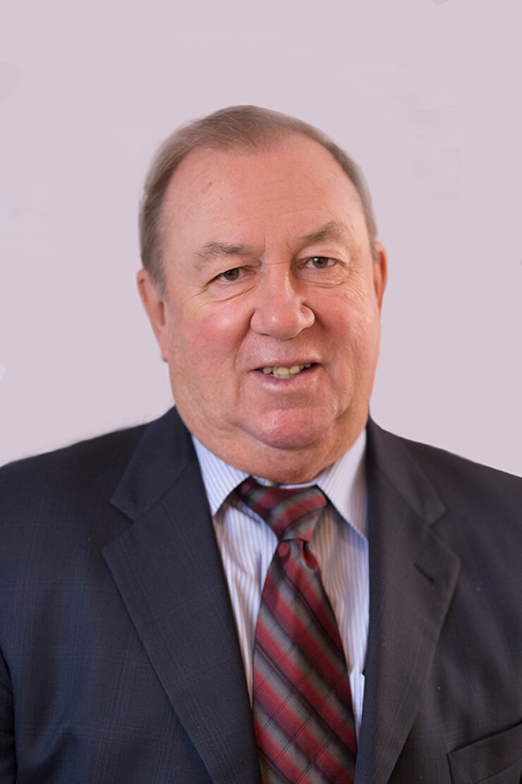 David C. Puckett, president/CEO of American 1 CU