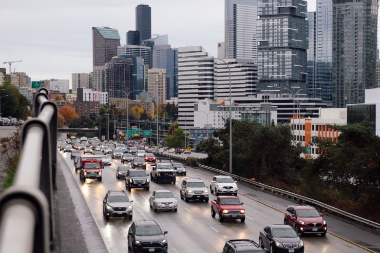 Vehicles travel on northbound Interstate 5 in the South Lake Union neighborhood of Seattle, Washington, U.S., on Sunday, Oct. 24, 2021. Concerns about Covid, crime and homelessness — and open warfare between the city government and parts of its lucrative tech and business sector — have emptied Seattle's commercial districts. Voters are hoping a new mayor will turn things around — but even though most are Democrats, they disagree on what change is needed. Photographer: Chona Kasinger/Bloomberg