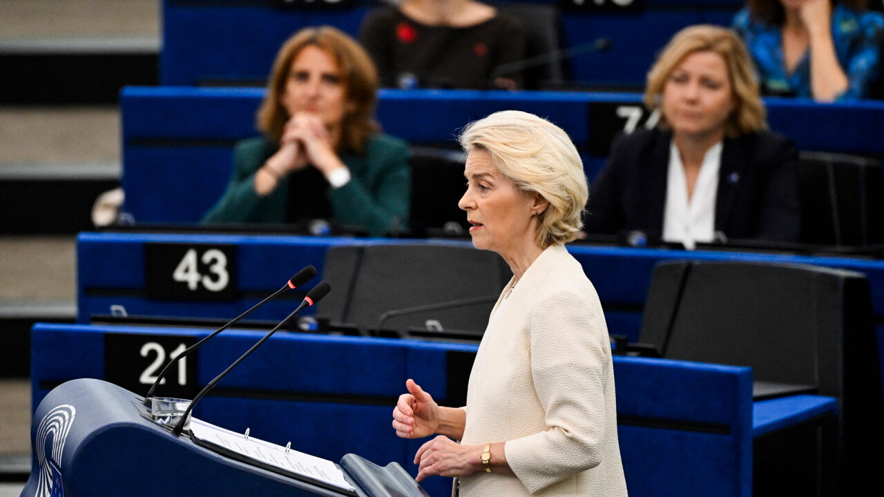 Ursula von der Leyen speaking at a podium
