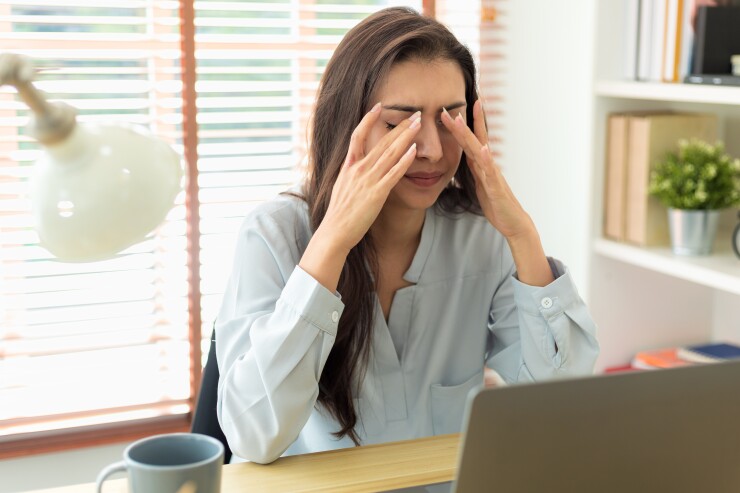 Woman stressed at work