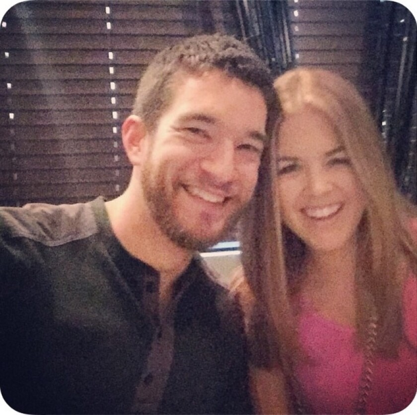 Alan and Mary Moore, wearing her pink shirt with the V-shaped back, at the 2016 TD Ameritrade LINC conference, before an unwanted encounter with another attendee.