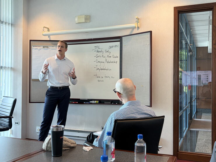 Andrew Swierenga, a financial advisor with Wheaton, Illinois-based Timothy Financial Counsel, discussed the firm's fee models in a presentation at the "Flat Fridays" event last month.