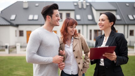 Young family buying house-Adobestock