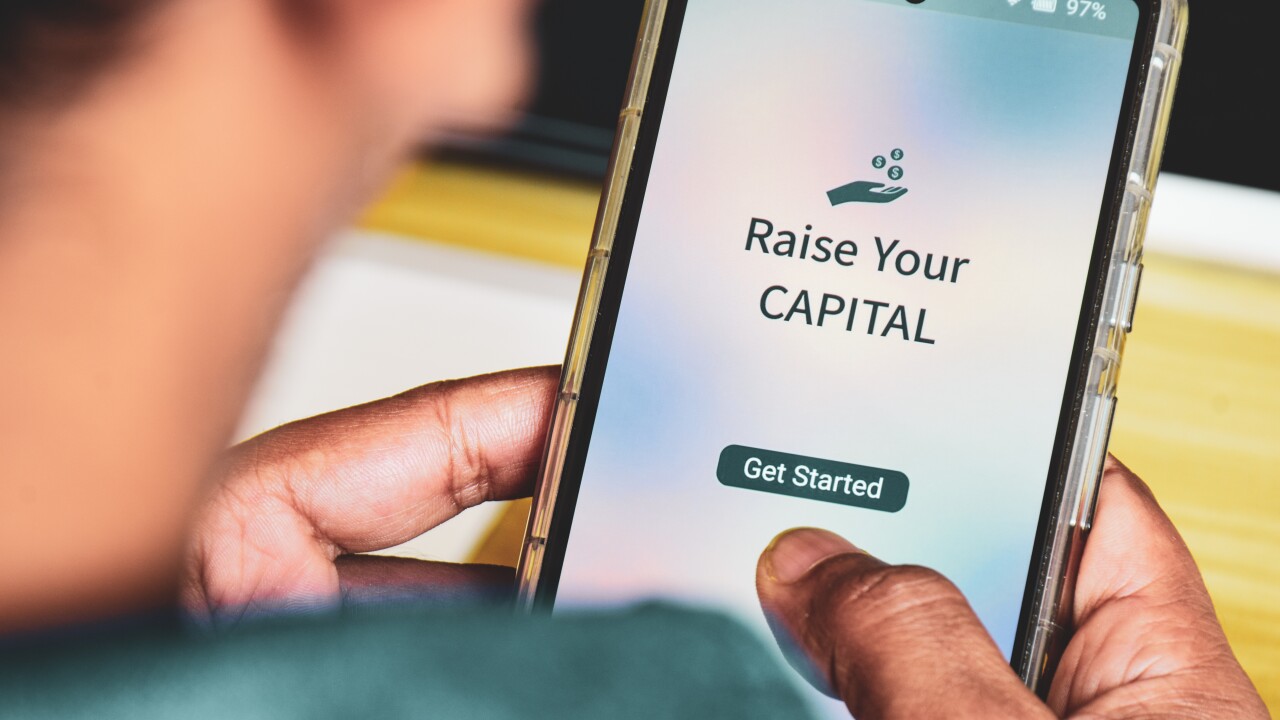 Businessman using mobile applications to raise capital for startup. Fundraising donation concept.