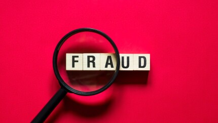 Fraud word concept on cubes