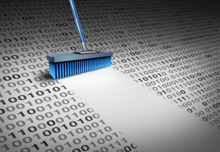 Broom brushing away 0 and 1 data bits.